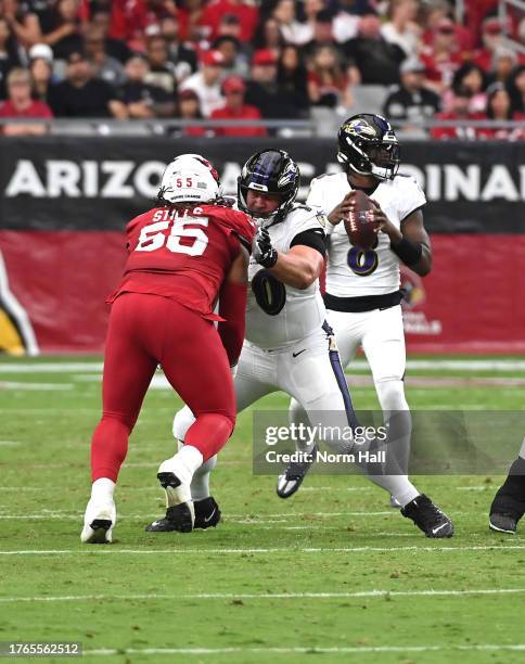 Kevin Zeitler of the Baltimore Ravens pass blocks against the Arizona Cardinals at State Farm Stadium on October 29, 2023 in Glendale, Arizona.