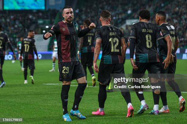 Kikas of CF Estrela da Amadora celebrates scoring CF Estrela da Amadora second goal during the Liga Portugal Betclic match between Sporting CP and CF...