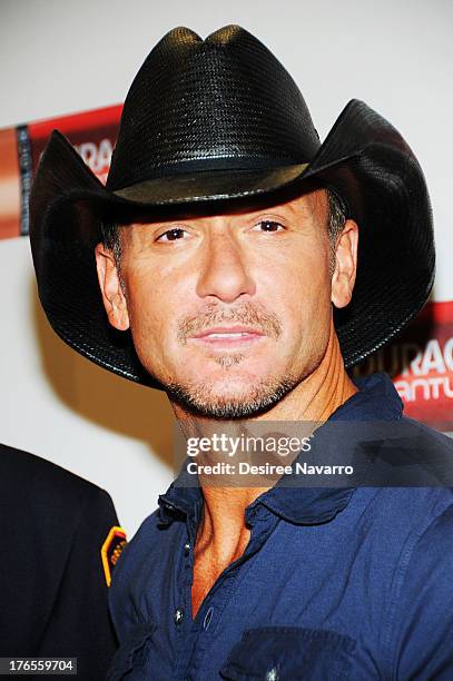 Singer Tim McGraw attends the "Quantum Heroes" premiere at Engine 33, Ladder 9 on August 15, 2013 in New York City.