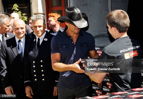 Tim McGraw attends the "Quantum Heroes" premiere at Engine 33, Ladder 9 on August 15, 2013 in New York City.