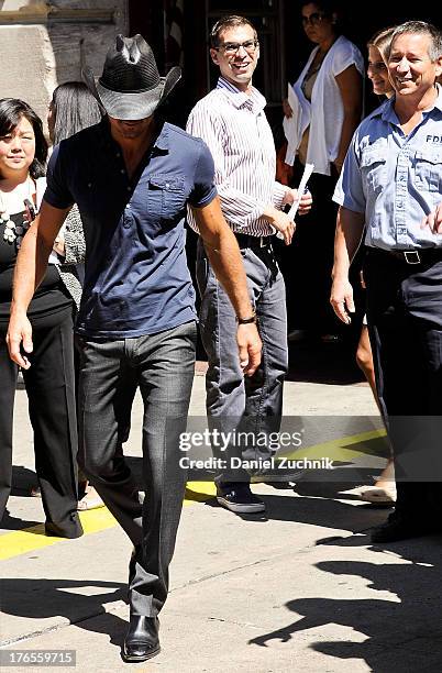 Tim McGraw attends the "Quantum Heroes" premiere at Engine 33, Ladder 9 on August 15, 2013 in New York City.