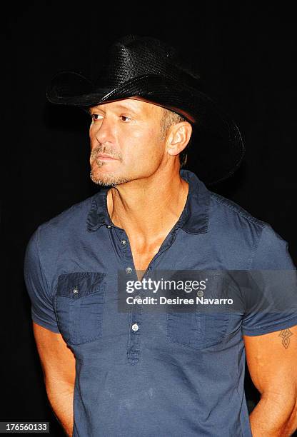 Singer Tim McGraw attends the "Quantum Heroes" premiere at Engine 33, Ladder 9 on August 15, 2013 in New York City.