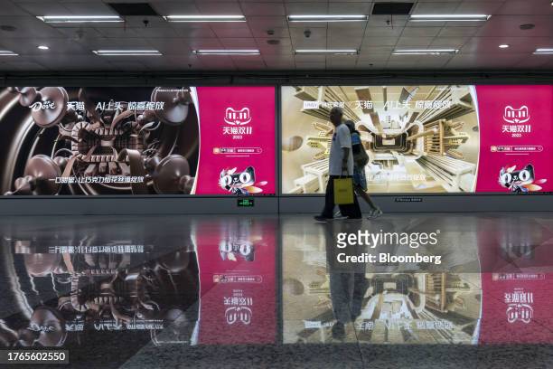 An advertisement for the Singles' Day shopping event on Alibaba Group Holding Ltd.'s Tmall e-commerce platform at a subway station in Shanghai,...