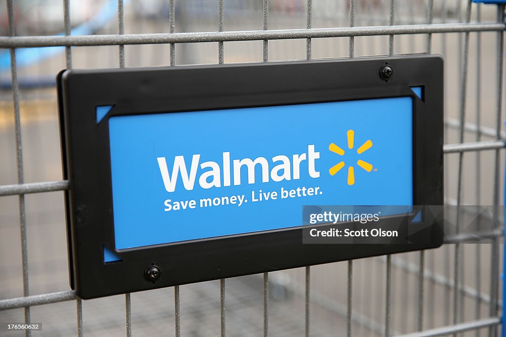 Wal-Mart Lowers Earnings Estimate After Weak Second Quarter