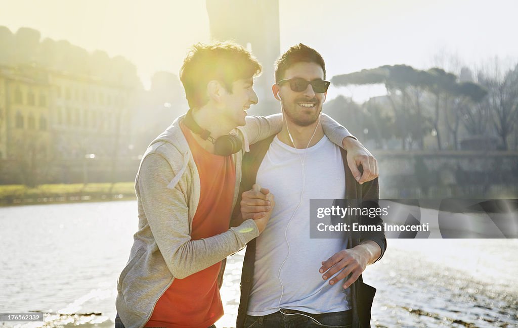 Friends, celebrating, sunset, river bank