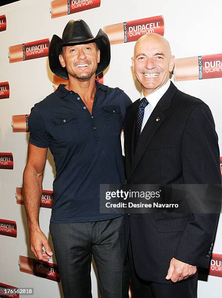 Singer Tim McGraw and New York City Fire Commissioner Salvatore J. Cassano attend the "Quantum Heroes" premiere at Engine 33, Ladder 9 on August 15,...