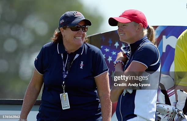 Meg Mallon the captain of USA Solheim Cup Team and Stacy Lewis share a laugh on the 7th hole during the practice round for the 2013 Solheim Cup at...