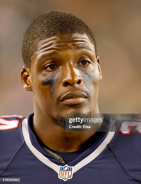 Adrian Wilson of the New England Patriots looks on from the bench in the second half against the Philadelphia Eagles on August 9, 2013 at Lincoln...