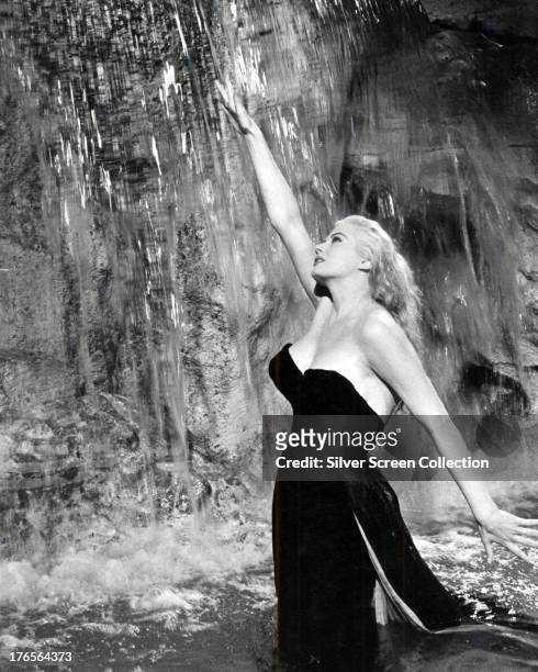 Swedish-American actress Anita Ekberg as Sylvia in the fountain scene from 'La Dolce Vita', directed by Federico Fellini, 1960.