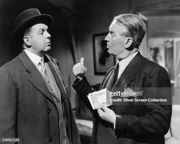 John McGiver , as Monsieur X, and Maurice Chevalier as Claude Chavasse in 'Love In The Afternoon', directed by Billy Wilder, 1957.