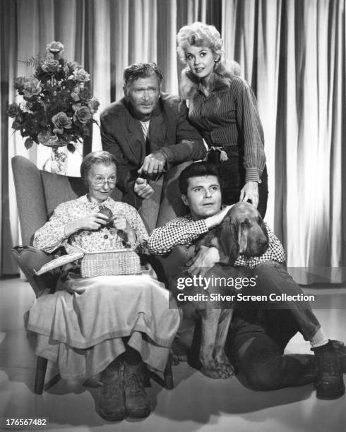 Members of the cast of the TV series 'The Beverly Hillbillies' in a publicity still, circa 1965. Clockwise, from left: Irene Ryan , as Granny Daisy...