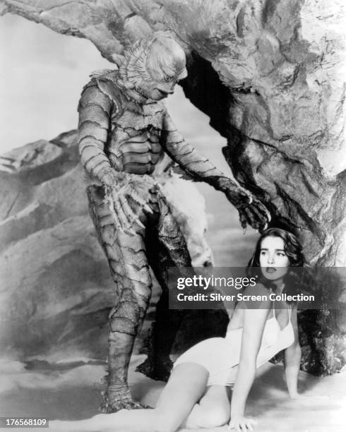 American actors Ben Chapman as Gill-man, and Julie Adams as Kay Lawrence, in 'Creature From The Black Lagoon', directed by Jack Arnold, 1954.