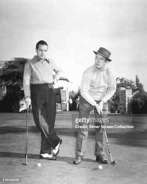 Singer and actor Bing Crosby and comedian and actor Bob Hope on a golf course, circa 1940.