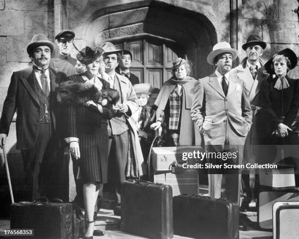 Cast members in a promotional portrait for 'Murder By Death', directed by Robert Moore, 1976. Left to right: James Coco as Milo Perrier, James...