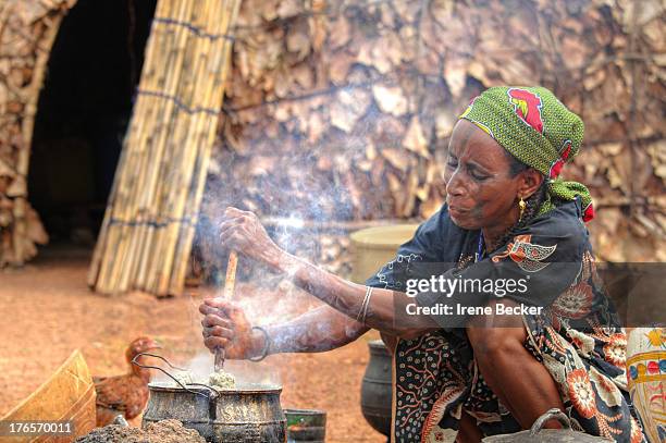 Fulani woman cooking in the morning. Marmara damishi farm in Kaduna State