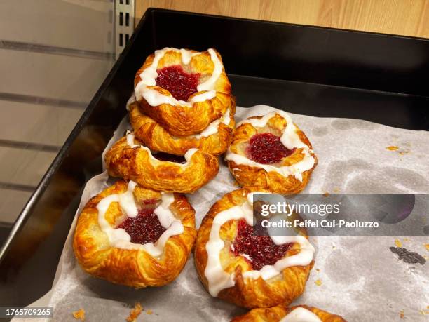 homemade danish pastry yeasted dough with strawberry jam - danish pastry stock pictures, royalty-free photos & images