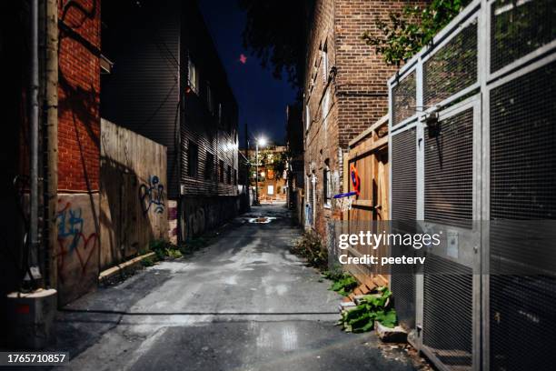 dark alley - montreal - montreal street stock pictures, royalty-free photos & images