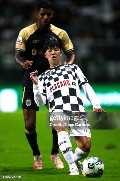 Matheus Reis of Sporting CP and Masaki Watai of Boavista FC battle for the ball during the Liga Portugal Bwin match between Boavista and Sporting CP...
