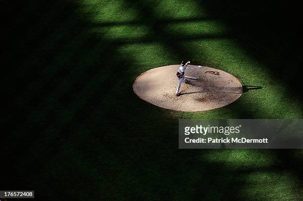 Guillermo Moscoso of the San Francisco Giants throws a pitch against the Washington Nationals during a game at Nationals Park on August 15, 2013 in...