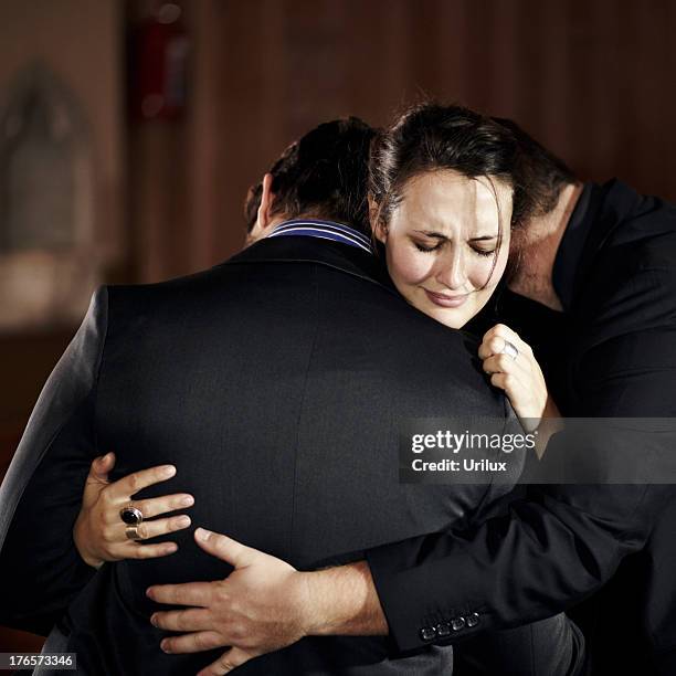Funeral Hugging Photos and Premium High Res Pictures - Getty Images