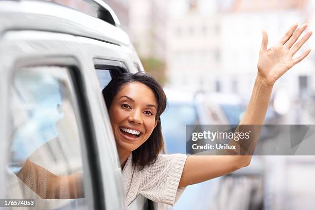 Waving Out Car Window Fotografías e imágenes de stock - Getty Images