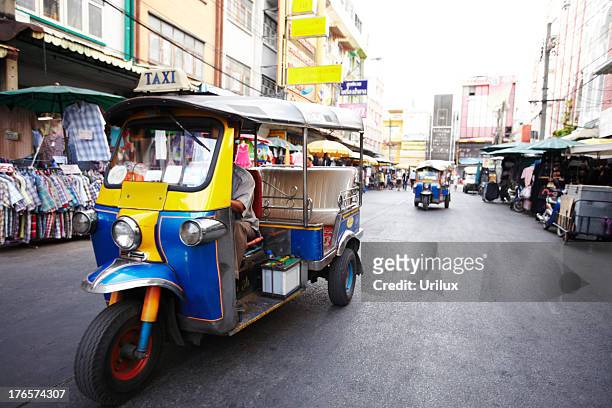 taking a taxi thai-style - jinrikisha stock pictures, royalty-free photos & images