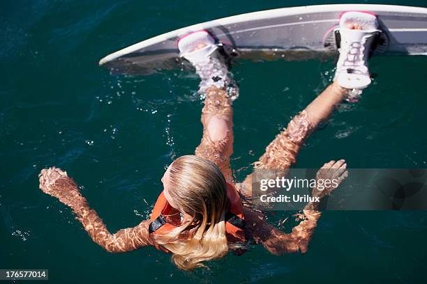 waiting for her next tow - wakeboarding - wakeboarden stockfoto's en -beelden