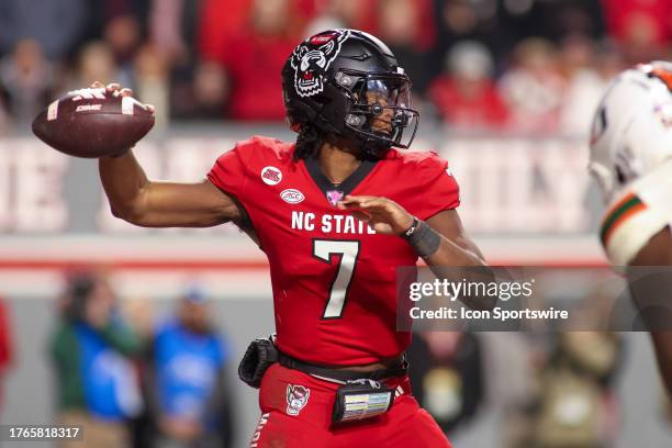 North Carolina State Wolfpack quarterback MJ Morris throws during the college football game between the North Carolina State Wolfpack and the Miami...