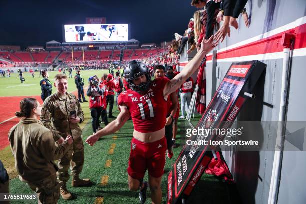 North Carolina State Wolfpack linebacker Payton Wilson thanks the fans after the college football game between the North Carolina State Wolfpack and...