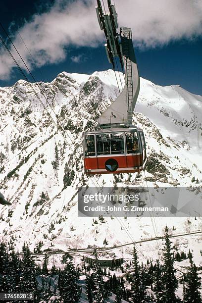 View of aerial tram carrying skiiers up to Hidden Peak at Snowbird Ski and Summer Resort. Salt Lake County, UT 3/17/1972 - 3/31/1972 CREDIT: John G....