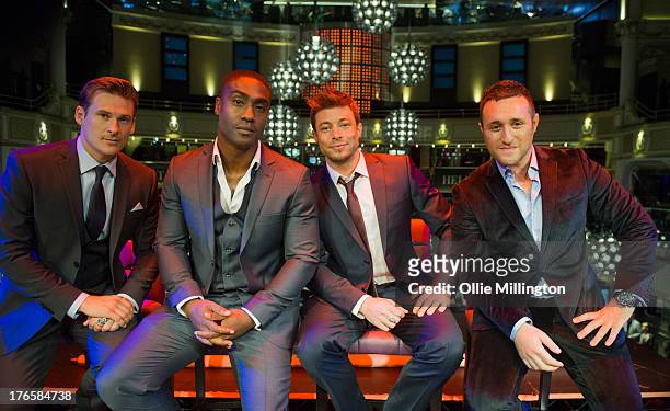 Lee Ryan, Simon Webbe, Duncan James and Anthony Costa of Blue pose at the premiere of the music video for the single 'Break My Heart' at Hippodrome...