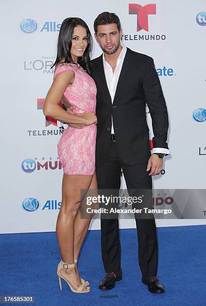 Georgina Holguin and Christian de la Campa attend Telemundo's Premios Tu Mundo Awards at American Airlines Arena on August 15, 2013 in Miami, Florida.