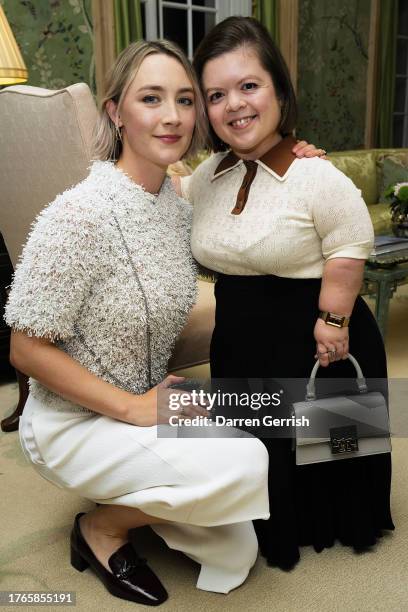 Saoirse Ronan and Sinead Burke attend the dinner in honor of Women Thought Leaders, Entrepreneurs and Creators on October 30, 2023 in London, England.