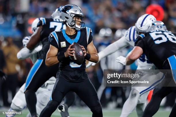 Carolina Panthers quarterback Bryce Young looks down field as the pocket collapses during a NFL game between the Indianapolis Colts and the Carolina...