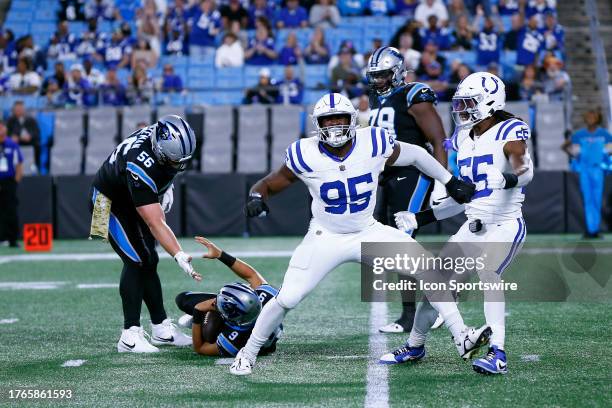 Indianapolis Colts defensive end Adetomiwa Adebawore reacts after sacking Carolina Panthers quarterback Bryce Young in the fourth quarter of play...