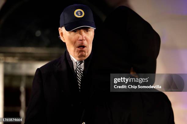 President Joe Biden reacts to a child's Halloween costume during a trick-or-treat event on the South Lawn of the White House on October 30, 2023 in...