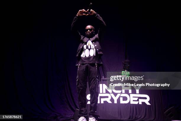 Tinchy Stryder performs on stage at Cardiff International Arena on October 30, 2023 in Cardiff, Wales.