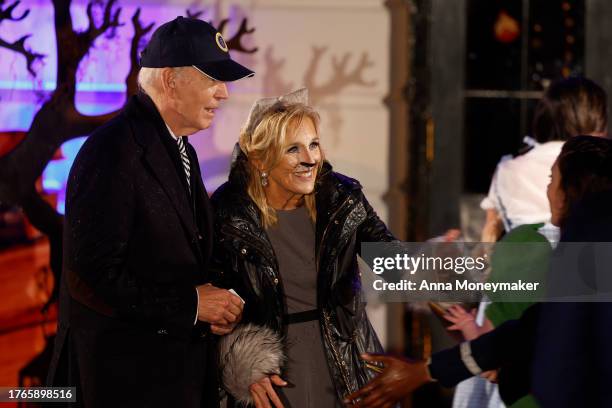 President Joe Biden and First Lady Jill Biden greet trick-or-treaters during a Halloween event on the South Lawn of the White House on October 30,...