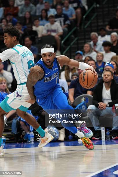 Jaden Hardy of the Dallas Mavericks dribbles the ball during the game against the Charlotte Hornets on November 5, 2023 at the American Airlines...