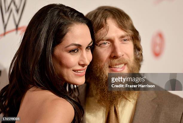 Diva Brie Bella and wrestler Daniel Bryan attend WWE & E! Entertainment's "SuperStars For Hope" at the Beverly Hills Hotel on August 15, 2013 in...