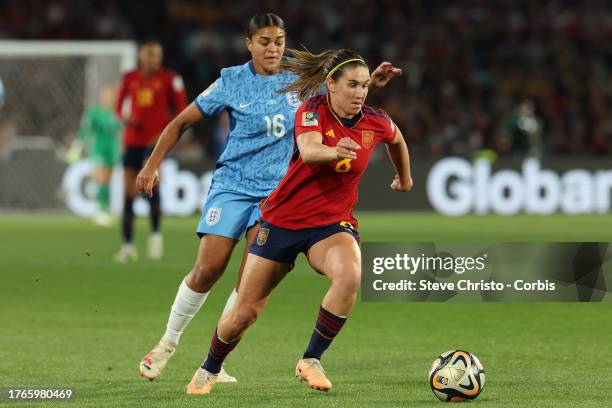 Mariona Caldentey of Spain competes with England's Jessica Carter during the FIFA Women's World Cup Australia & New Zealand 2023 Final match between...