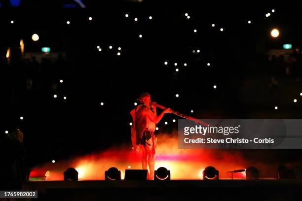 An Aboriginal digeridoo player plays for the acknowledgement to country in the pre game entertainment during the FIFA Women's World Cup Australia &...