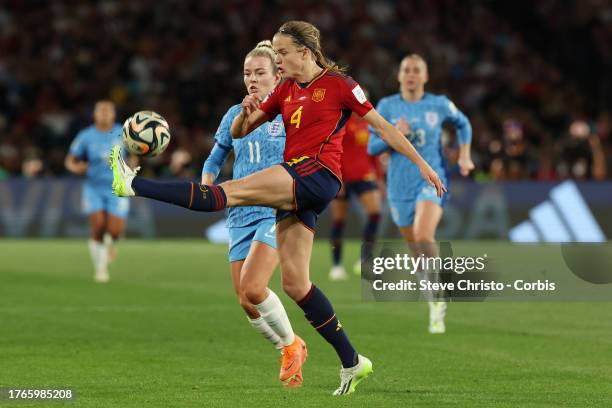 Irene Paredes of Spain clears the ball in front of England's Lauren Hemp during the FIFA Women's World Cup Australia & New Zealand 2023 Final match...