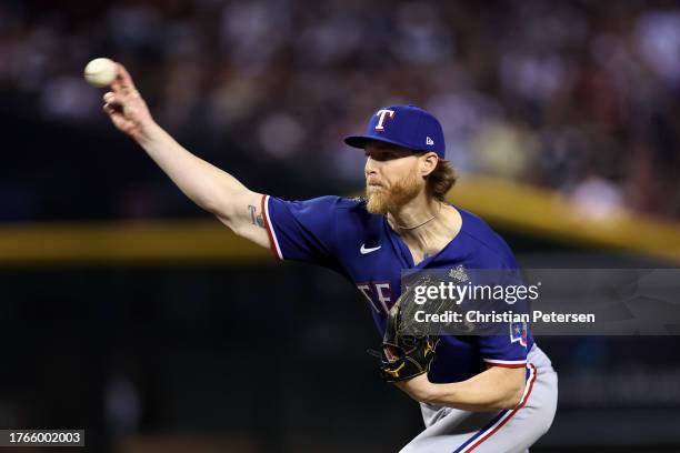 Jon Gray of the Texas Rangers pitches in the fourth inning against the Arizona Diamondbacks during Game Three of the World Series at Chase Field on...