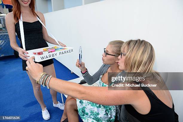 General view of the atmosphere at Warby Parker's store opening in The Standard, Hollywood on August 15, 2013 in Los Angeles, California.