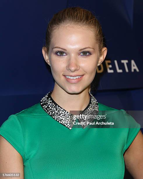 Actress Claudia Lee attends the Delta Air Lines summer celebration In Beverly Hills on August 15, 2013 in Beverly Hills, California.