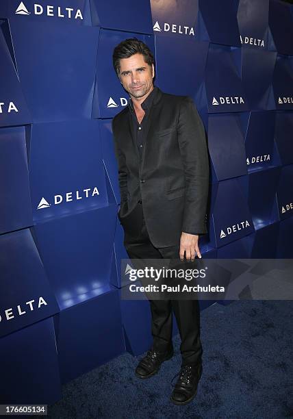 Actor John Stamos attends the Delta Air Lines summer celebration In Beverly Hills on August 15, 2013 in Beverly Hills, California.