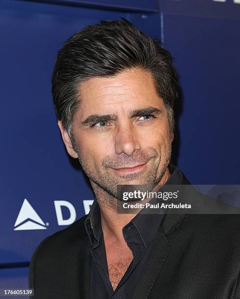 Actor John Stamos attends the Delta Air Lines summer celebration In Beverly Hills on August 15, 2013 in Beverly Hills, California.
