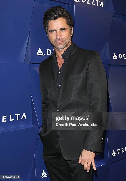 Actor John Stamos attends the Delta Air Lines summer celebration In Beverly Hills on August 15, 2013 in Beverly Hills, California.