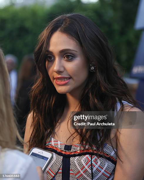 Actress Emmy Rossum attends the Delta Air Lines summer celebration In Beverly Hills on August 15, 2013 in Beverly Hills, California.